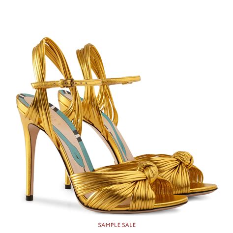 gold Gucci sandals